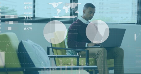 Image of financial data processing over african american businessman in office