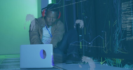 Image of data processing over african american it man by computer servers