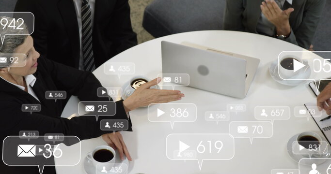 Image of social media data processing over diverse business people in office