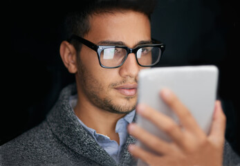 Business, office and Indian man with tablet, glasses and internet for research, website info and...
