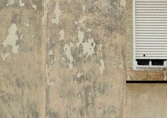 Vintage Charm. Old Wall with White Blinds Window Frame. Negative space.