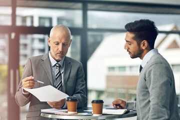 Man, documents and business meeting in office for management, advice and teamwork with mentor....