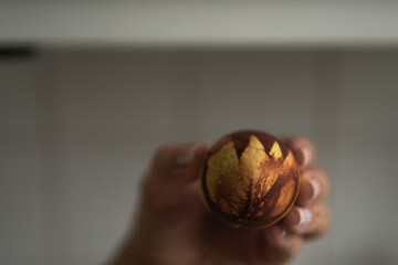 easter eggs in the hand of the girl
