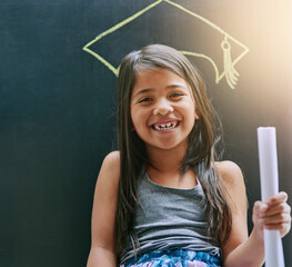 Portrait, little girl and blackboard with drawing, graduation cap and smile with daydreaming,...