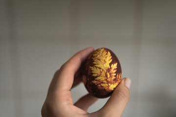 easter eggs in the hand of the girl