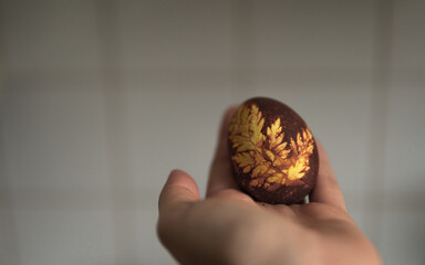 easter eggs in the hand of the girl