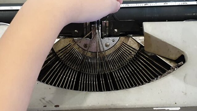 Stuck typewriter keys or stuck typing machine keys