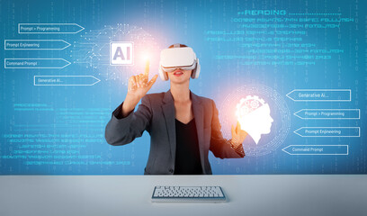 Smart business woman pointing at holographic while wearing VR goggles and sitting at table with keyboard. Project manager generated AI and coding engineering prompt and programing system. Contraption.