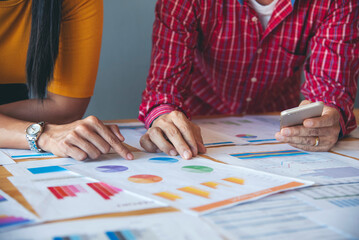 Obraz premium Top view business people meeting together at office desk in conference room. Team business meeting partnership planning brainstorming together. Team Collaborate group of partner company brainstorming