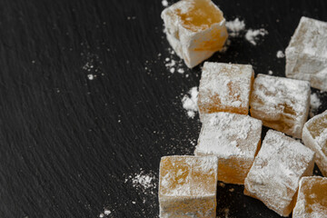 Eastern sweetness Turkish delight on a black background