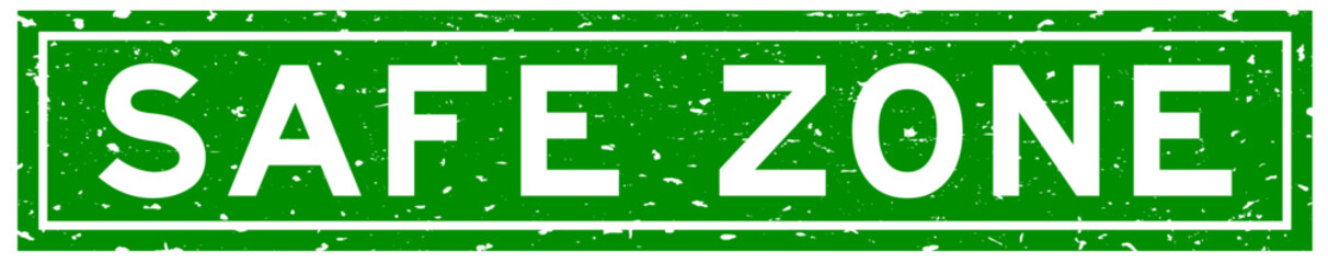 Grunge green safe zone word square rubber seal stamp on white background © bankrx