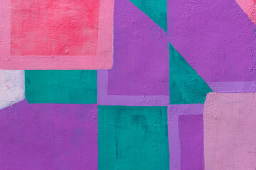 Close up of a geometric mural paint, wall textured background, small part of a big colorful street art graffiti on wall. 