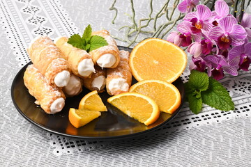 Homemade baking - grandma baked sweet puff pastry tubes,
filled with snow from egg whites or whipped cream,
traditional Czech delicacy.