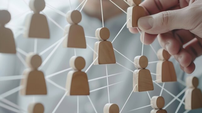 Organizational chart with human resource managers hand placing wooden piece concept about career the ladder of success hiring higher job or position HR organigram professionnal organiz : Generative AI