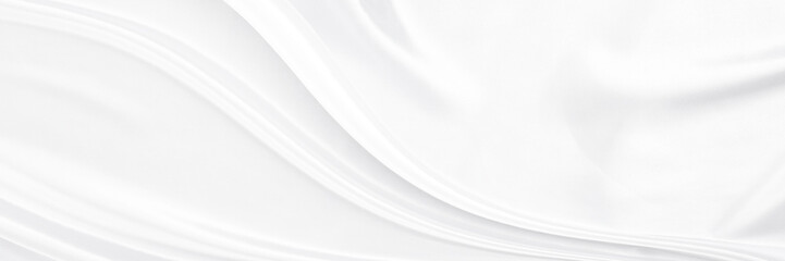 White gray satin texture that is white silver fabric silk panorama background with beautiful soft blur pattern natural.