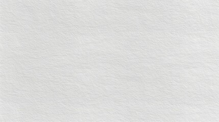 A close up view of a white toilet paper showing delicate paper texture