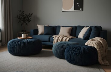 Two knitted dark blue poufs corner sofa. Scandinavian home interior design of modern living room.