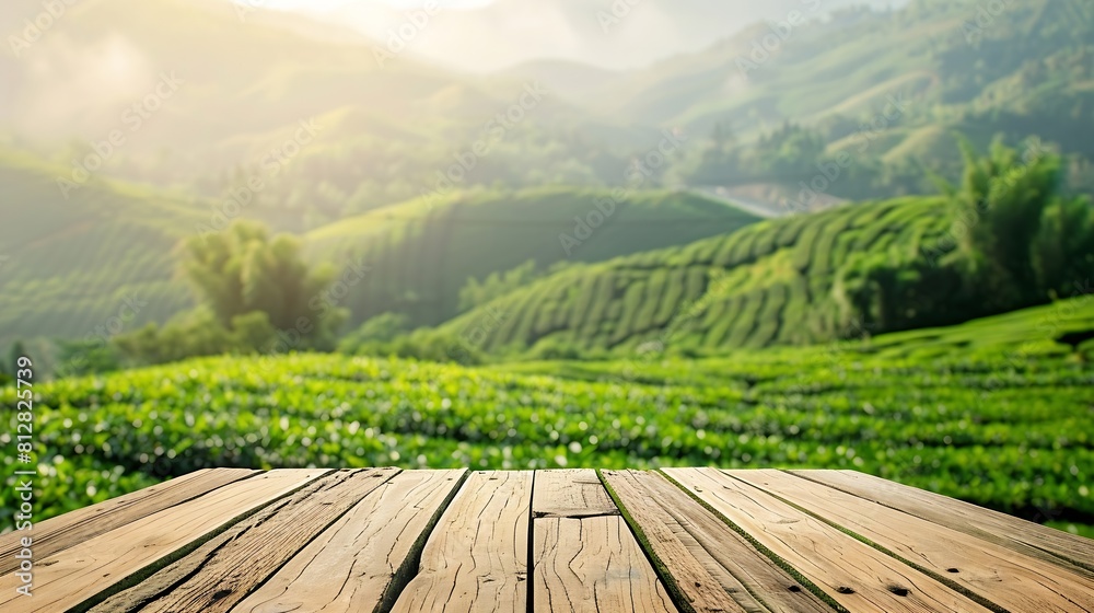 Leinwandbilder wooden table top on blur green tea mountain and grass fieldfresh and relax conceptfor montage produc