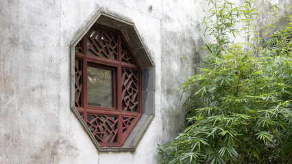 Traditional Chinese wooden windows in Suzhou gardens