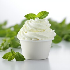 Ice cream in a white cup.