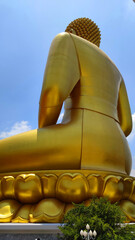 Big Golden Buddha Statue in Wat Pak Nam Phasi Charoen or Pak Nam Temple - It is famous for its large seated Buddha that is the largest in Bangkok Thailand - Travel Sculpture and Architecture Religion 
