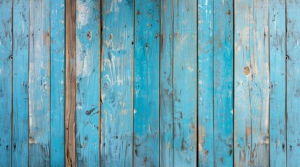 Blue wooden fence. Old wooden background. Blue painted wooden planks.