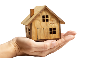 Hand holding a small simple house on isolated transparent background