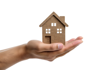 Hand holding a small simple house on isolated transparent background