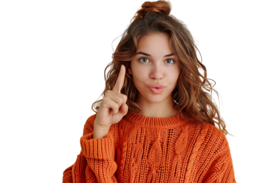 Confident woman dressed orange sweater pointing finger empty space on isolated transparent background