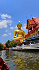 Big Golden Buddha Dhammakaya Tep Mongkol Buddha at Paknam Bhasicharoen temple or Wat Paknam Bhasicharoen in Bangkok Thailand 