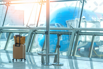 Travel luggage suitcase at the airport terminal in waiting area departure flight for business transportation security traveller belongings safety and vacation journey insurance concept