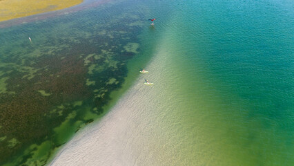 Drone photo of kayaks on the white sandbar on the waters of Tampa Bay, Florida