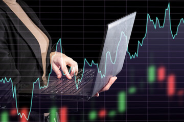 Investor with laptop. Trader chart up. Increase in company share price. Cropped businesswoman. Girl...