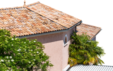 Typical Romanesque roof tiles, France. House, covered with the typical Roman tiles in various earth tones. Tiled house roof, isolated, PNG cutout.