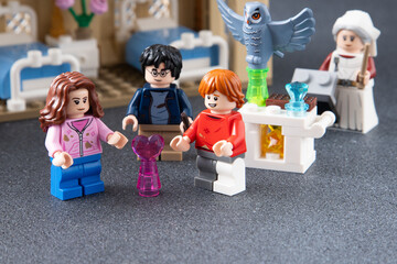 Fototapeta premium Lego Harry Potter minifigures. Children's designer toy made of bricks and plastic parts. Ukraine, Kyiv - January 17, 2024.