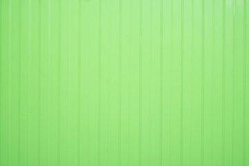 A green metal steel background with white lines