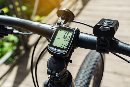 Bicycle computer on the handlebars of mountain bike.