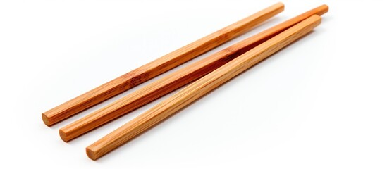 A copy space image of wooden chopsticks on a white background