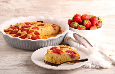 Slice of strawberry cornmeal cake, served