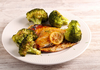 Lemon dorada fish with broccoli