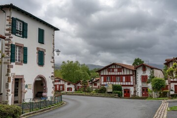 typical colourful Basque houses in the mountain village of Ainhoa in the Pyrenees
