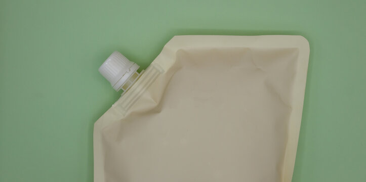 Eco-friendly spout pouch for liquid packaging. Copy space. 