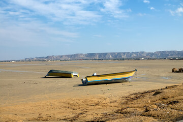 Fishing boats at the bottom of the bay (cove) at low tide, equinoctial springs (syzygy). Qeshm...