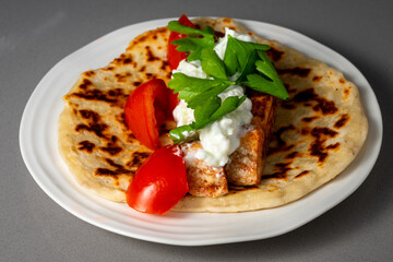 Greek gyro with grilled salmon