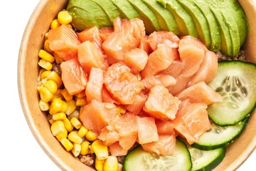 Top view of a fresh salmon poke bowl with avocado, cucumber, corn, and quinoa on a white background.