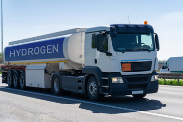 Fototapeta premium Truck with hydrogen tank trailer. Hydrogen transportation concept