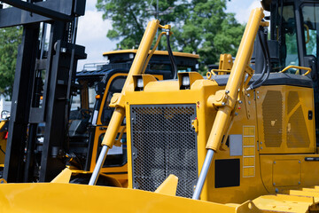 Fleet of yellow construction machines