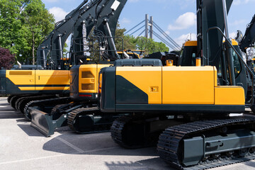 Fleet of yellow construction machines