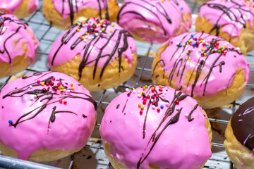 Bread topped with strawberries sprinkled with colorful sugar.