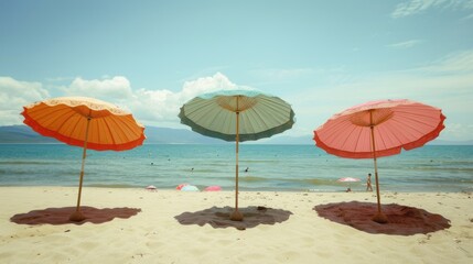 Colorful Chinese paper parasols for shade at the sunny beach. summer day